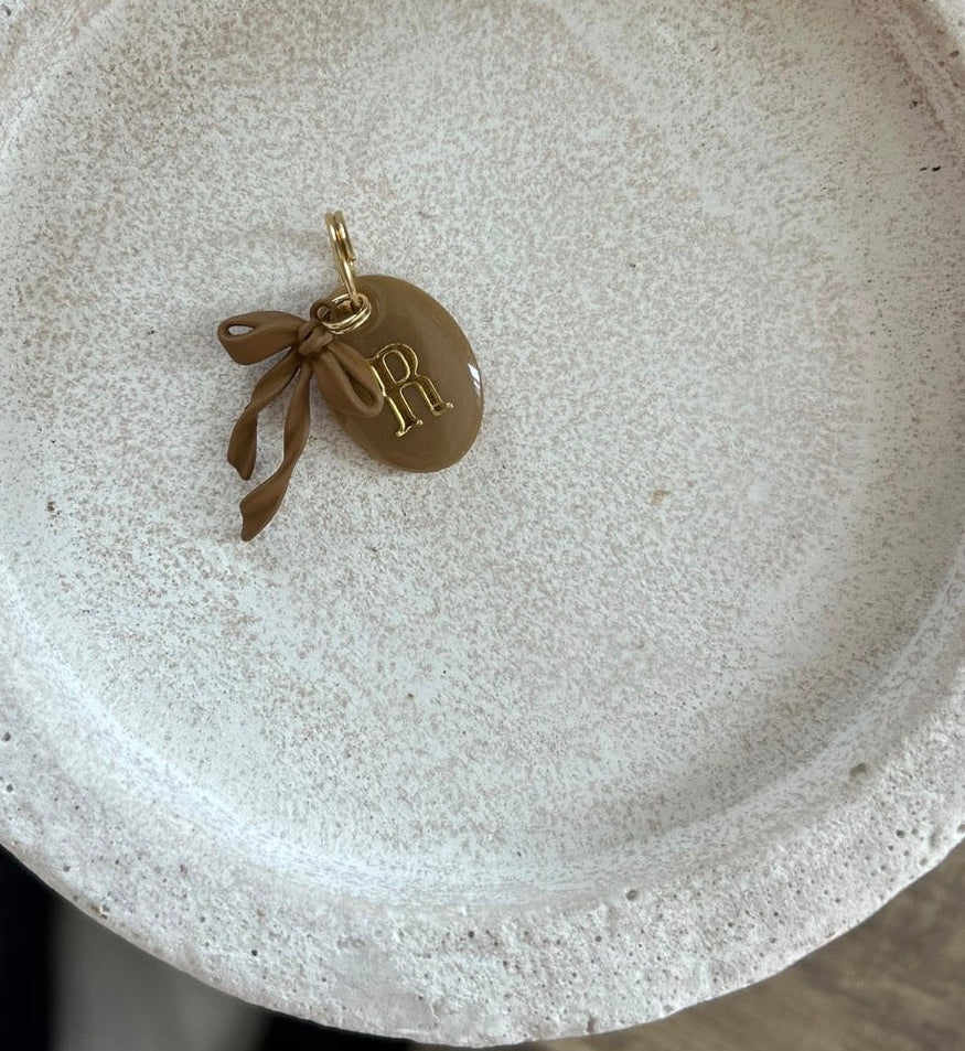 Hazel Bow ID tag